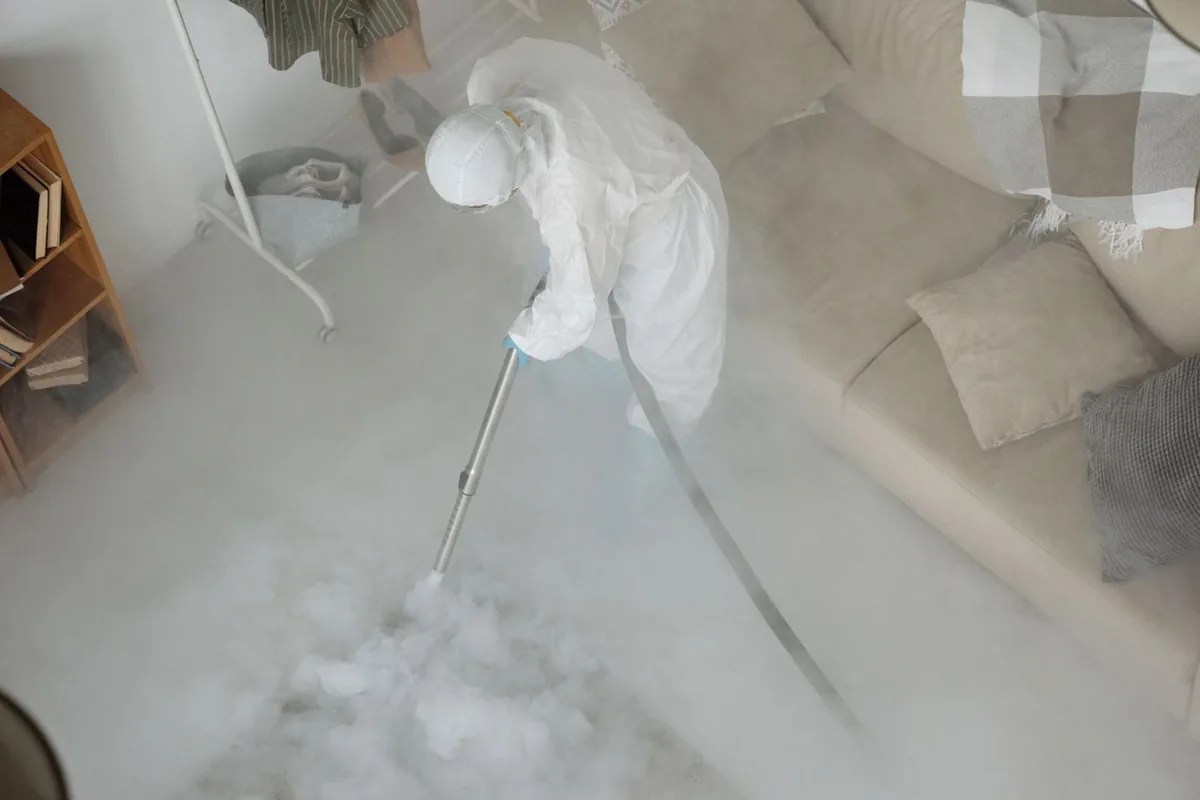 Biohazard cleanup technician in protective equipment, Nantucket, MA